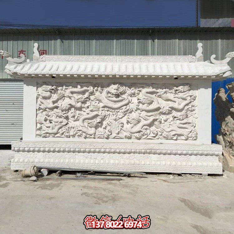 九龍壁石雕為景區(qū)廣場(chǎng)增添獨(dú)特美感 九龍壁石雕為景區(qū)廣場(chǎng)增添獨(dú)特美感