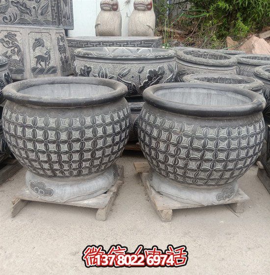 自然美學(xué)結(jié)合青石石雕、浮雕、編織、雕塑的戶(hù)外園林魚(yú)缸